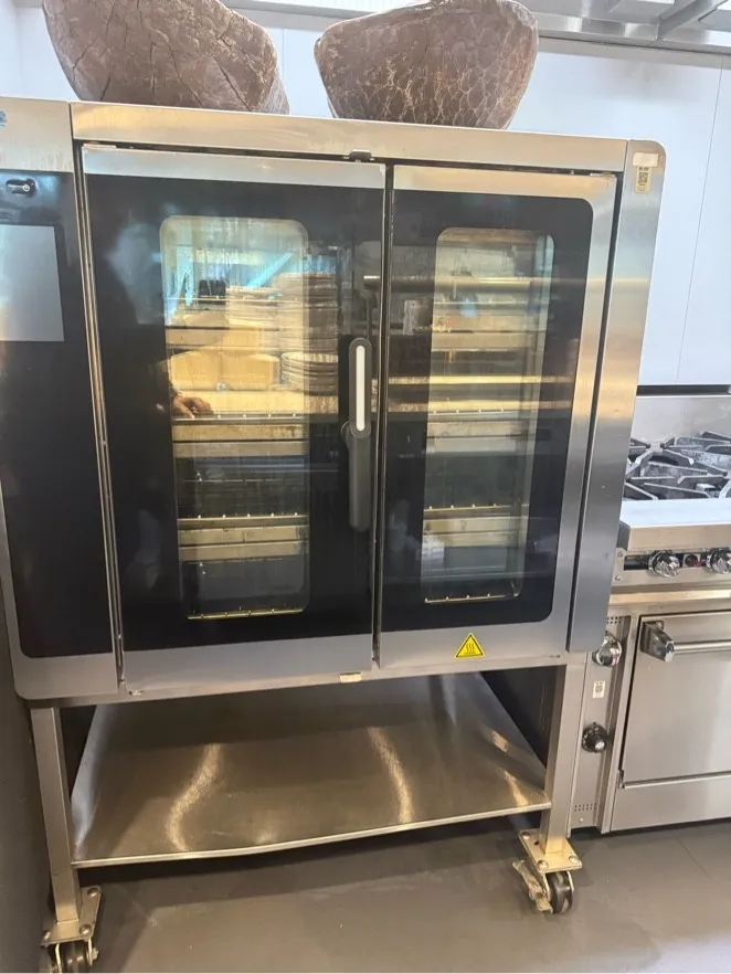 Stainless combi oven and stand after detail cleaning